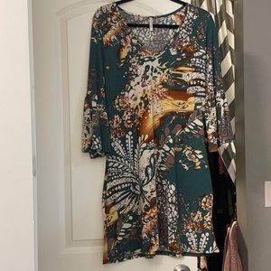 Green print dress with flare sleeves and POCKETS!